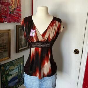 gidani orange and brown deep v vintage top